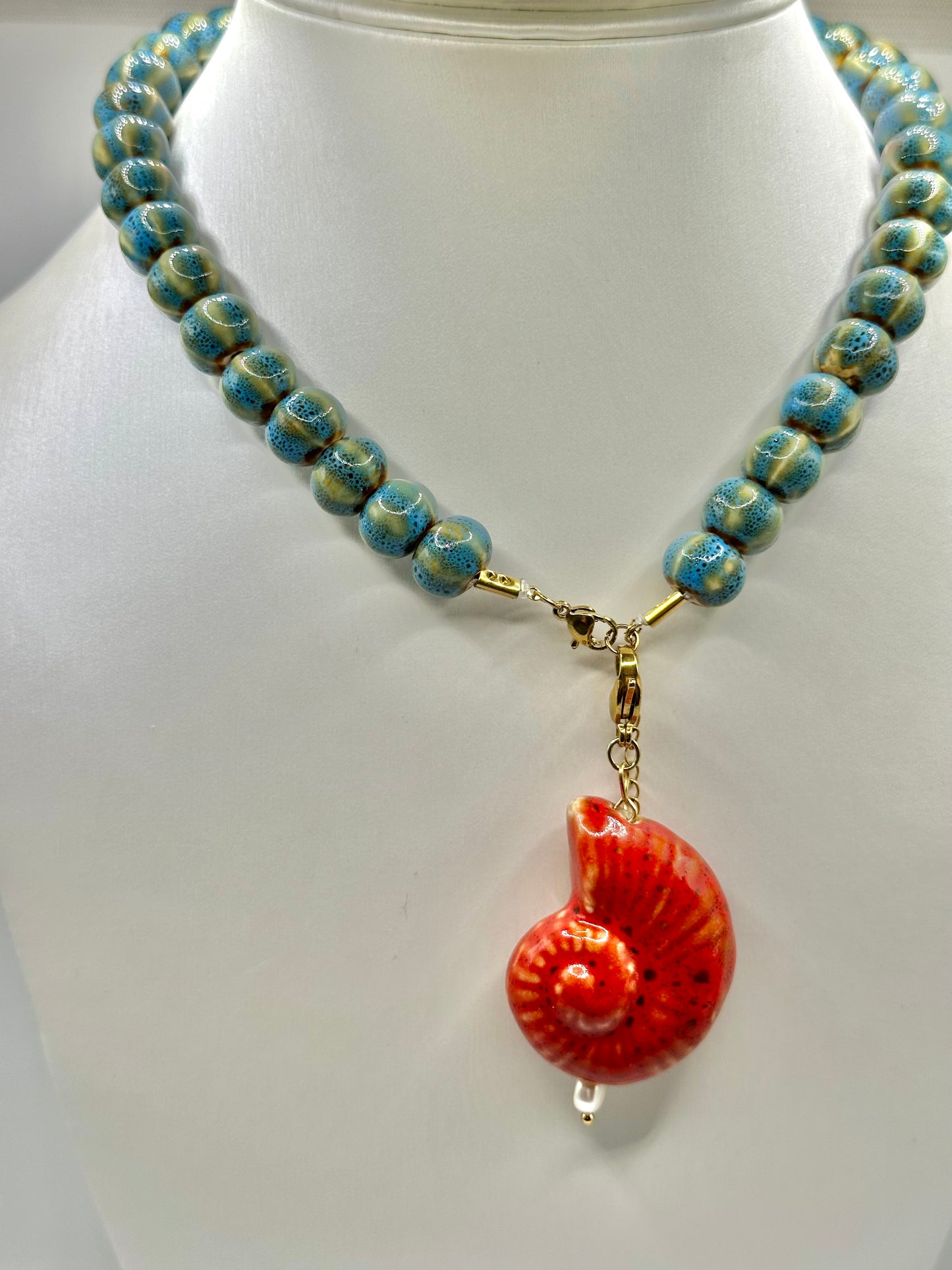 CHARM CARACOLA ROJA